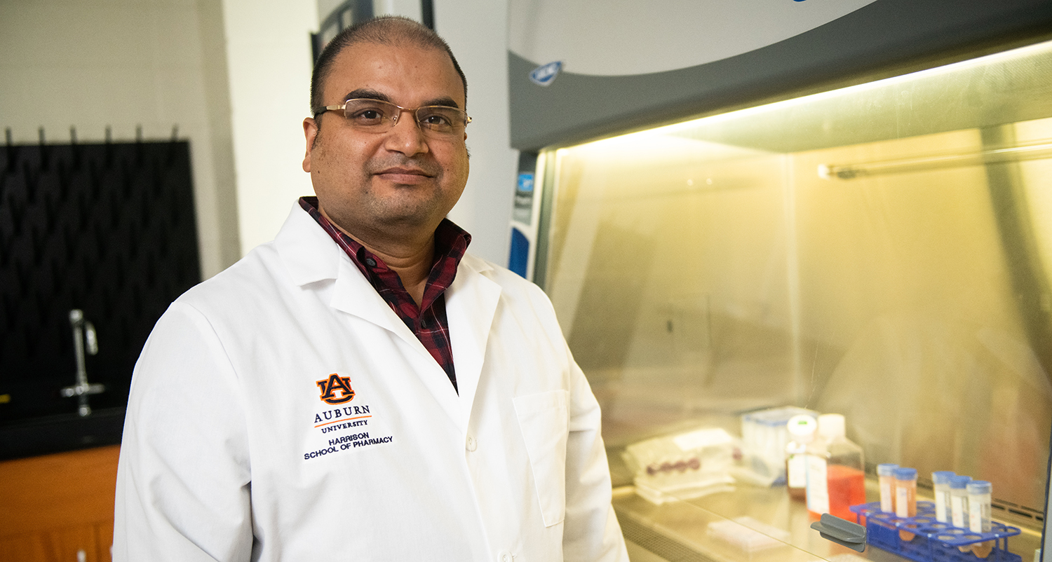 Dr. Mitra in the lab
