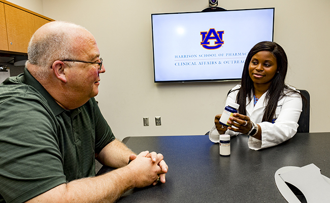 Student and patient in evaluation room