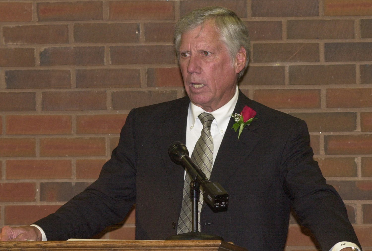 Jim Walker speaks at podium